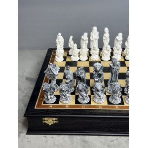 Шахматы подарочные “Русские сказки” в ларце с мраморными фигурами 