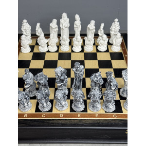 Шахматы подарочные “Русские сказки” в ларце с мраморными фигурами 