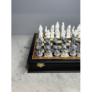 Шахматы подарочные “Русские сказки” в ларце с мраморными фигурами 