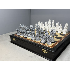 Шахматы подарочные “Русские сказки” в ларце с мраморными фигурами 