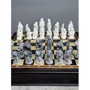 Шахматы подарочные “Русские сказки” в ларце с мраморными фигурами 